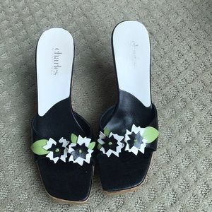 Black wedge heels with flower embellishment